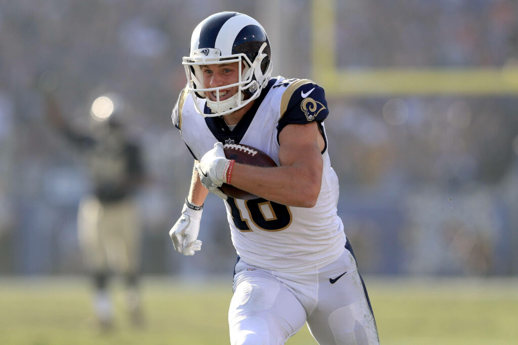 Cooper Kupp LA Rams sprinting with football dynamic NFL run action wallpaper background