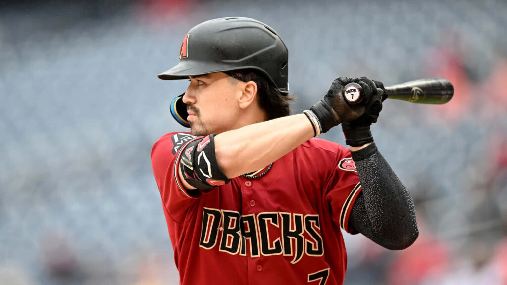 Corbin Carroll in Arizona Diamondbacks uniform ready to bat with focused intense energy wallpaper