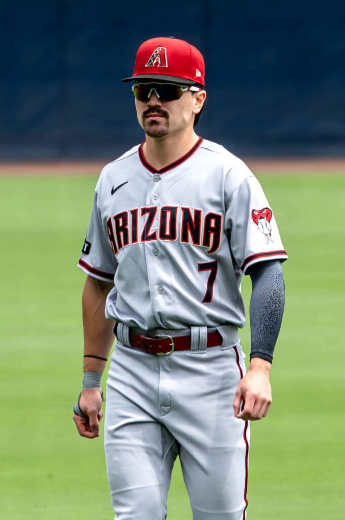 Corbin Carroll in Arizona Diamondbacks uniform focused on field professional MLB player wallpaper