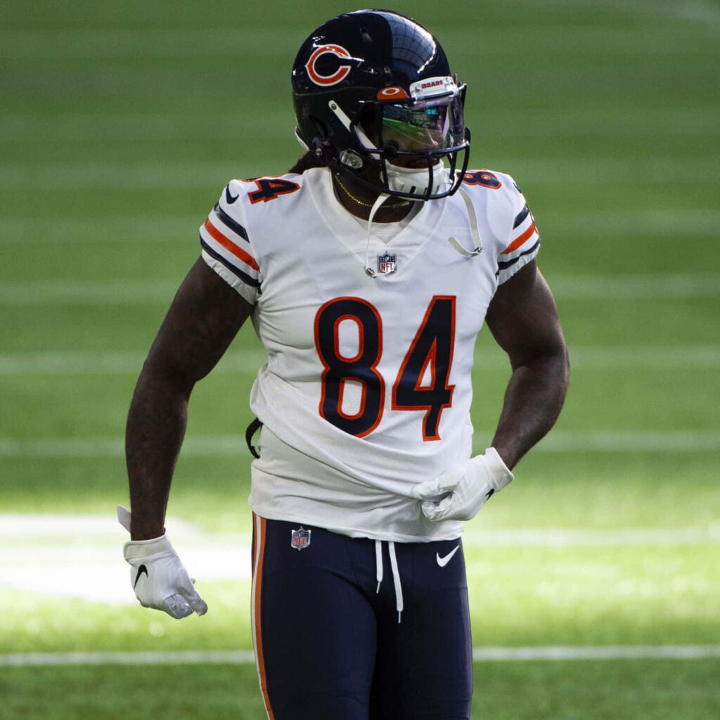 Cordarrelle Patterson in Chicago Bears white jersey number 84 on green turf focused NFL player Wallpaper