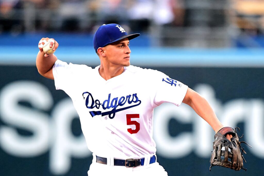 Corey Seager throwing baseball in Los Angeles Dodgers uniform vibrant action wallpaper background