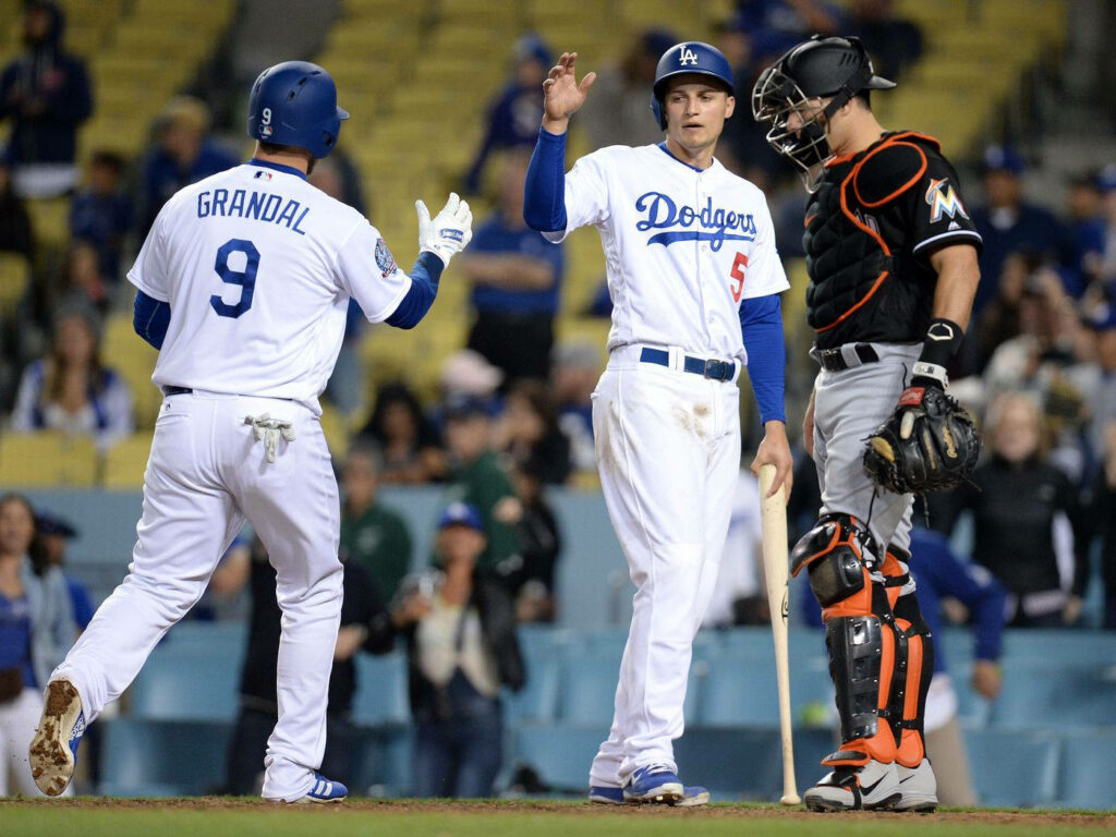 Corey Seager Dodgers waves to Yasmani Grandal at home plate Miami Marlins catcher watches game Wallpaper