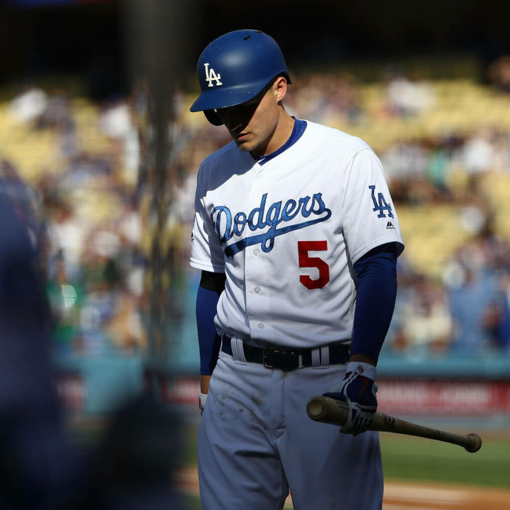 Corey Seager Dodgers uniform thoughtful pose sunlight stadium blurred background wallpaper