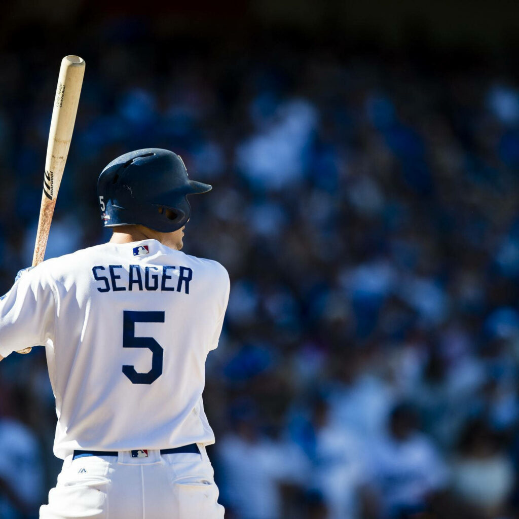 Corey Seager Dodgers uniform number 5 ready to bat dynamic baseball game with blurred crowd background Wallpaper