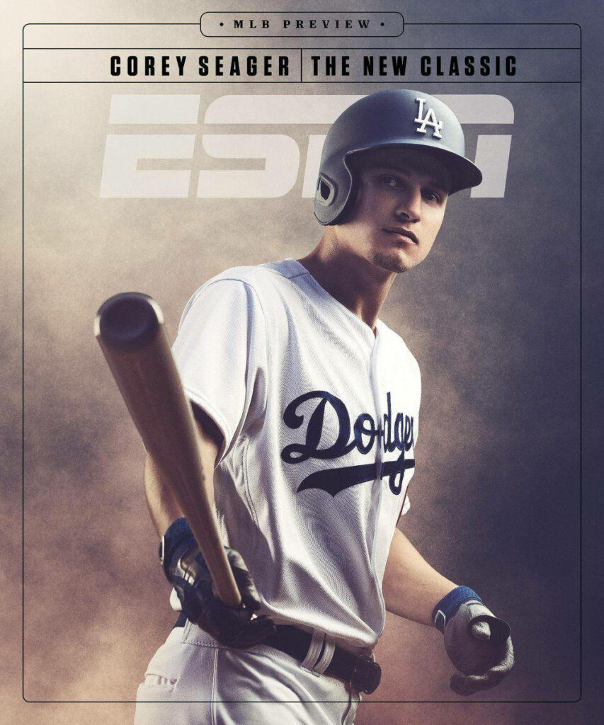 Corey Seager in Los Angeles Dodgers uniform focused in dynamic baseball action with smoky background Wallpaper
