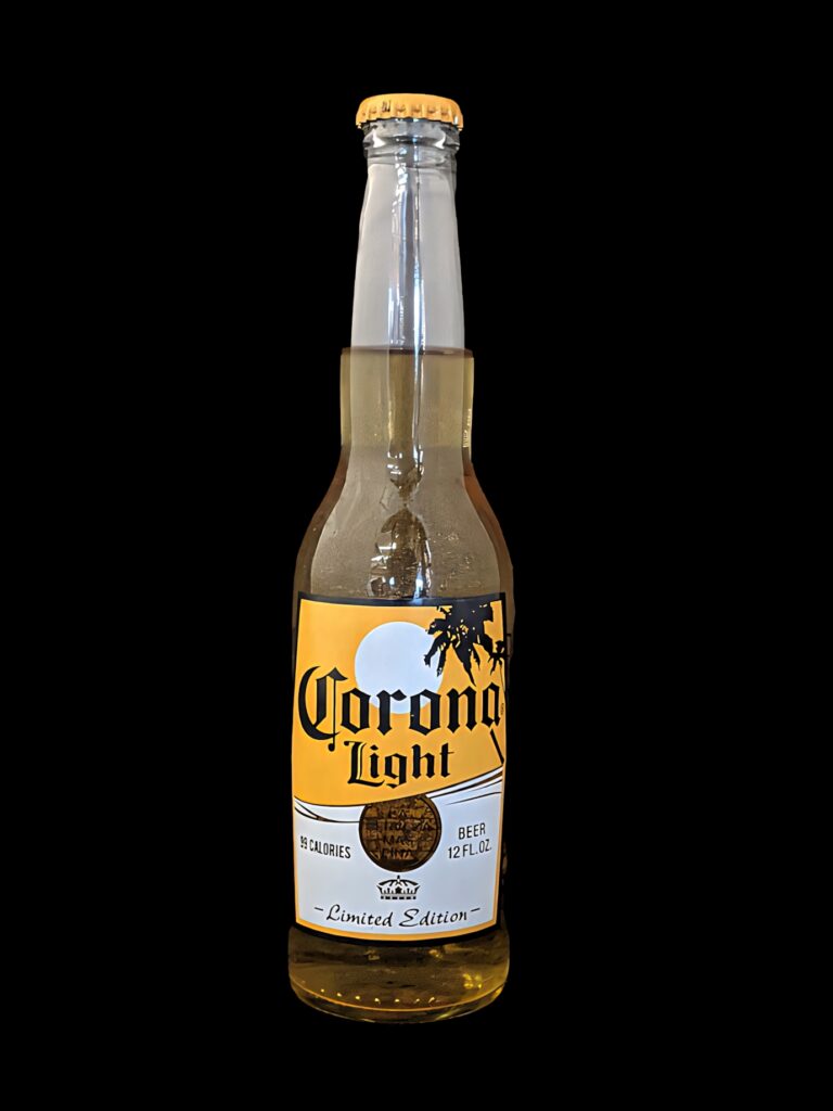 Corona Light Beer Limited Edition bottle with golden hue and clear label on black background Wallpaper