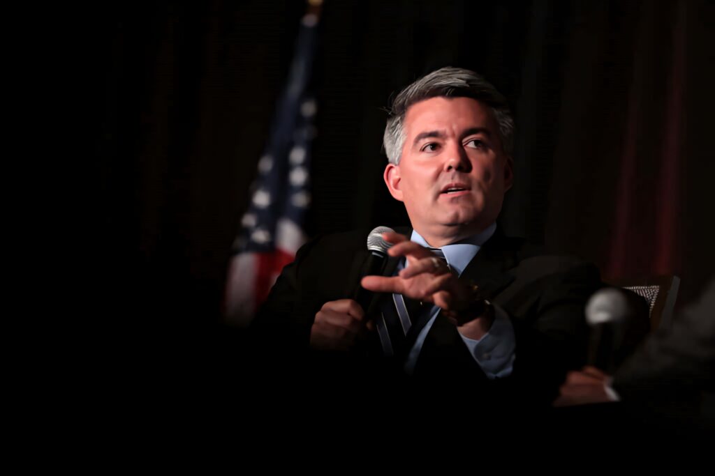 Cory Gardner speaking with American flag background professional leadership public speaking wallpaper