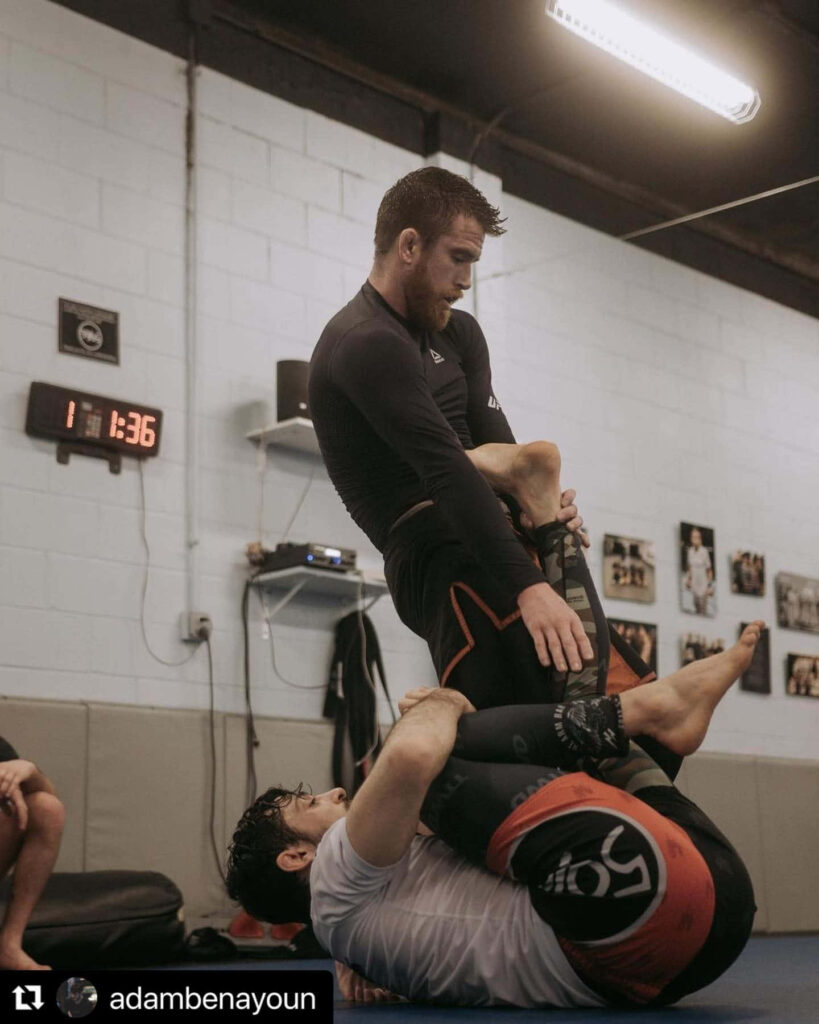 MMA fighter Cory Sandhagen intense training session athleticism gym focus mixed martial arts Wallpaper