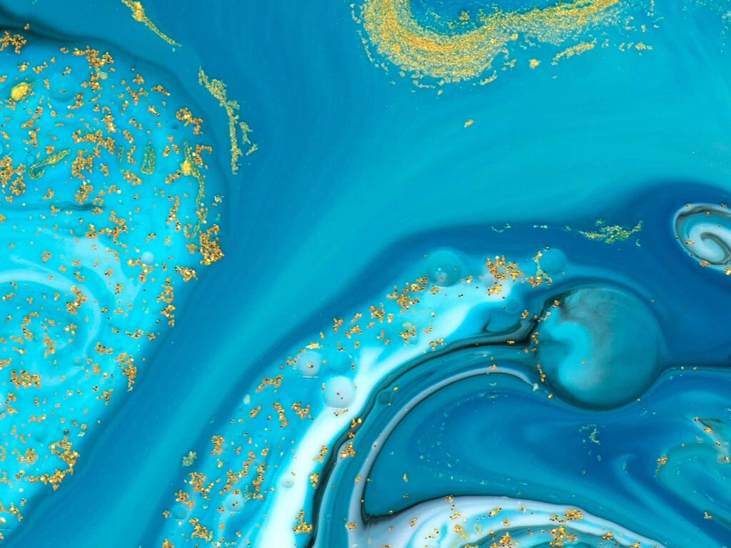 Cosmic Beauty: Sparkly Blue Wallpaper with Turquoise and Gold Accents
