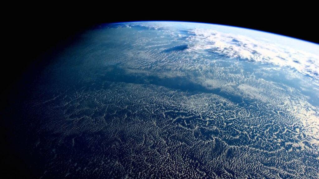 Magnificent Captured View of Earth from Spacecraft Perspective: An Exquisite 4k Background Photo Wallpaper