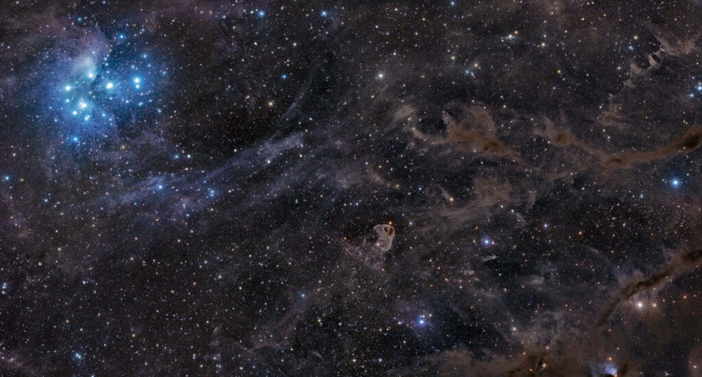 Mesmerizing cosmic wallpaper featuring stars, glowing nebulae, and an astronaut in deep space.