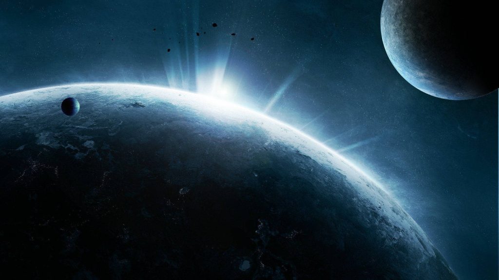 CGI cosmic sunrise over a mysterious planet with glowing light rays and deep blue space tones Wallpaper
