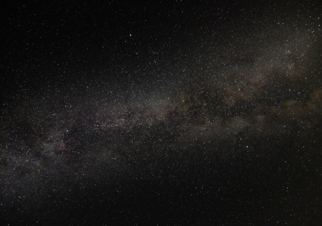 Cosmic Wonder: Nebula & Stars Wallpaper Background