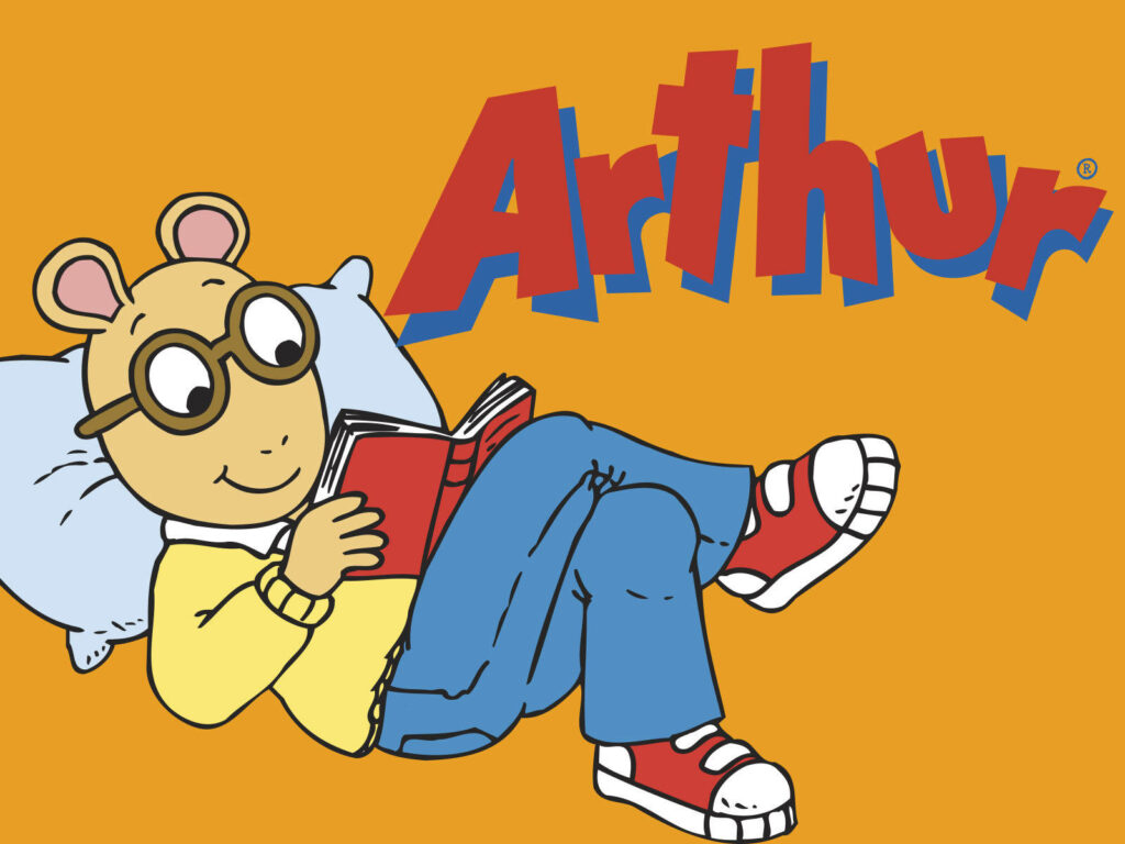 A Cozy Cartoon Moment with Arthur: Relaxing and Reading in a Vibrant Orange Setting Wallpaper