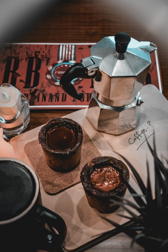 Cozy Aesthetic Coffee Setup: Metal Maker & Rustic Ambiance Wallpaper