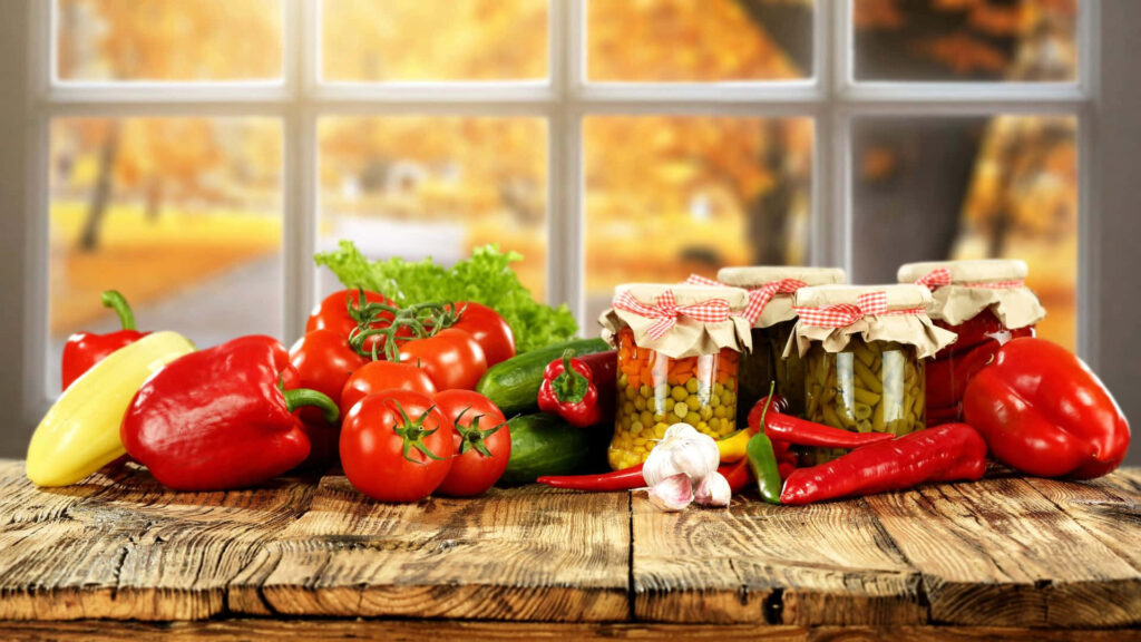Cozy Autumn Vegetable Display & Homemade Preserves Wallpaper