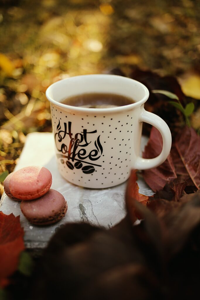 Cozy Autumn Wallpaper: Hot Coffee, Macarons & Leaves Scene