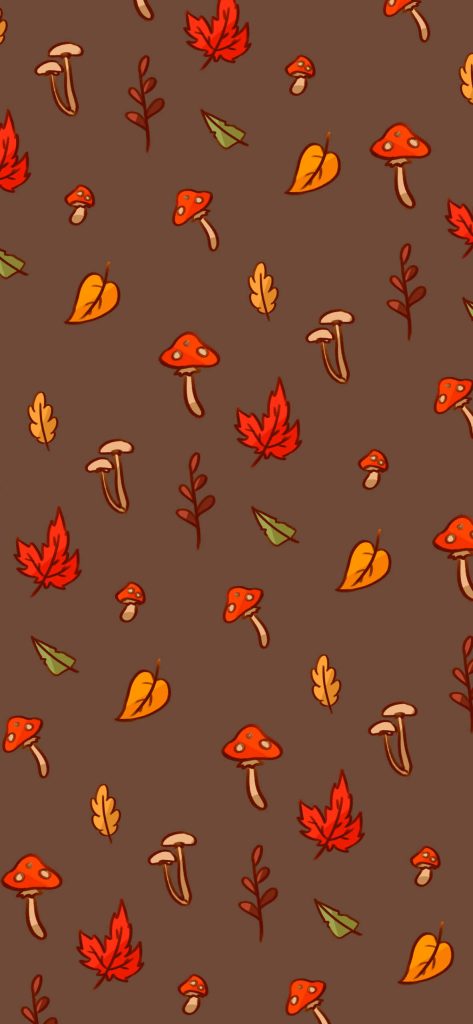 Cozy autumn wallpaper with red mushrooms and vibrant maple leaves on tan background seamless pattern