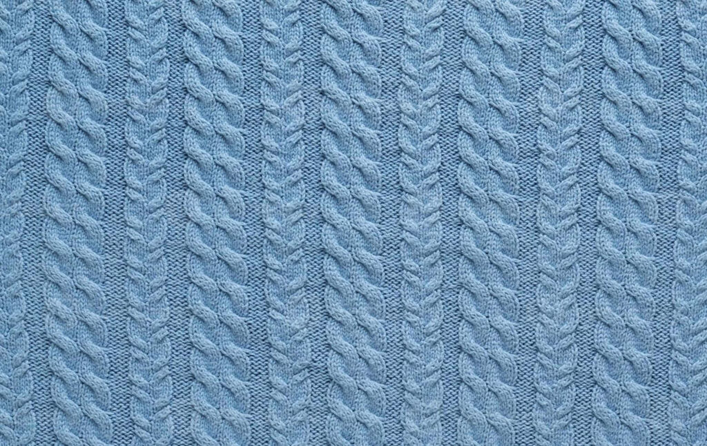 Cozy Blue Knitted Wool Wallpaper: Elegant Braided Texture Background