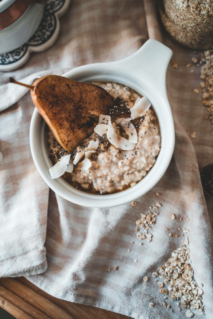 Cozy Oatmeal Wallpaper: Creamy Bowl with Pear, Coconut & Chia Seeds