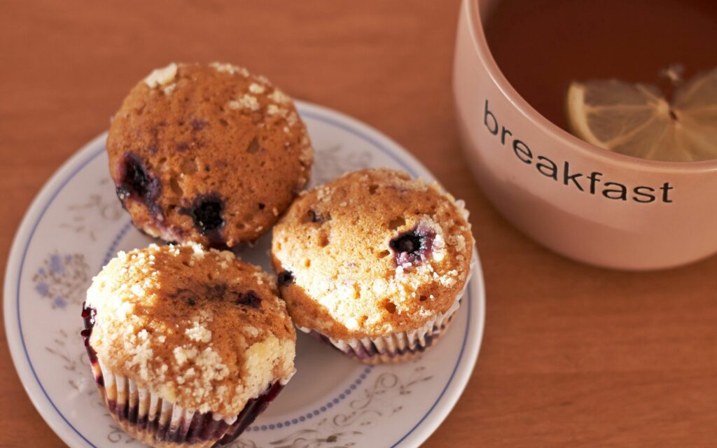 Cozy Breakfast Wallpaper: Fresh Muffins & Tea for Ultimate Comfort