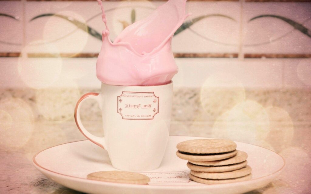 Cozy Breakfast Wallpaper: Pink Drink & Biscuits on Light Background