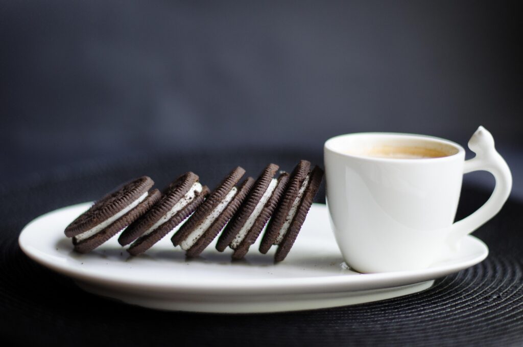 Cozy Breakfast Wallpaper: White Coffee Cup & Chocolate Cookies