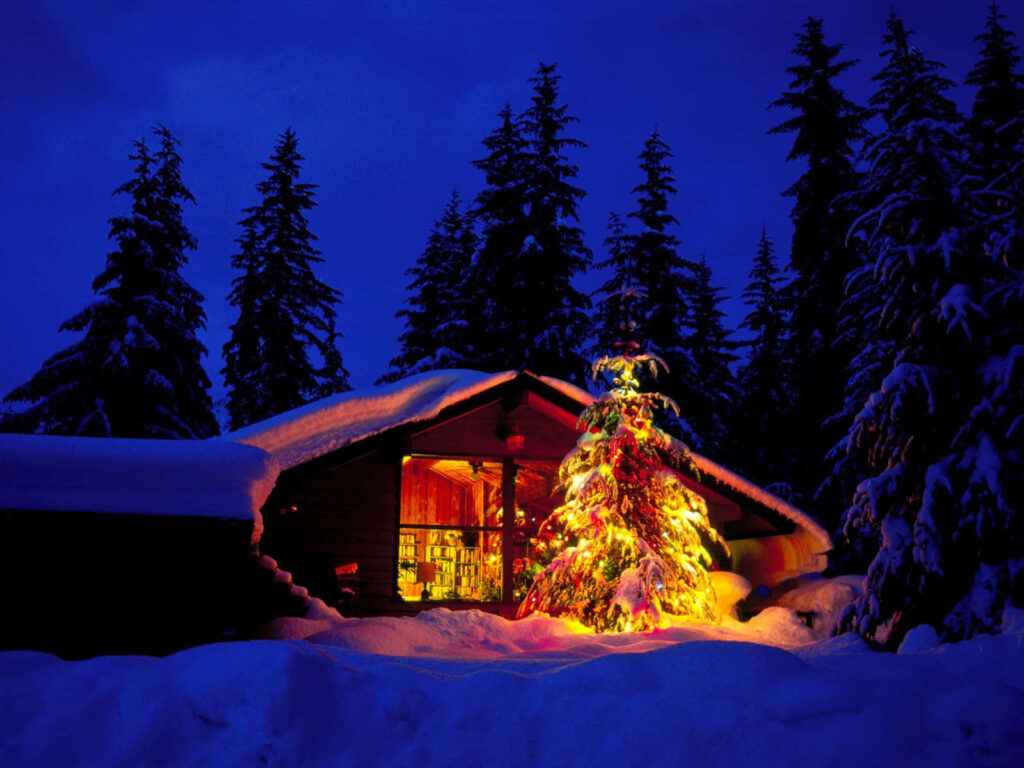Cozy Cabin Wallpaper: Festive Christmas Scene in Snowy Landscape