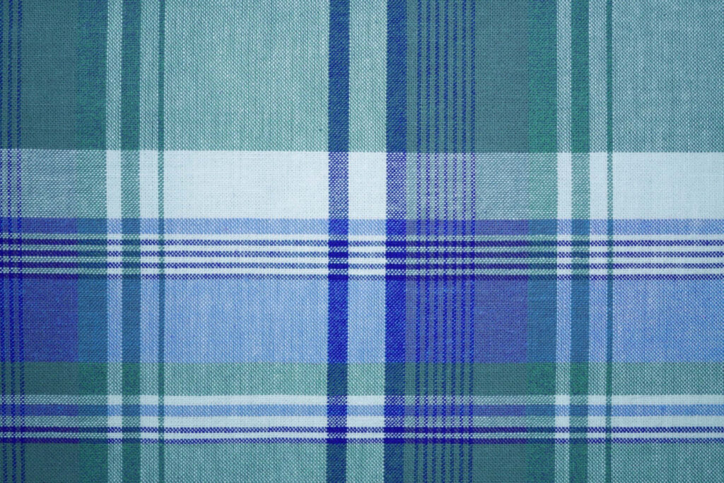 Cozy Blue and Green Checkered Fabric Wallpaper Background