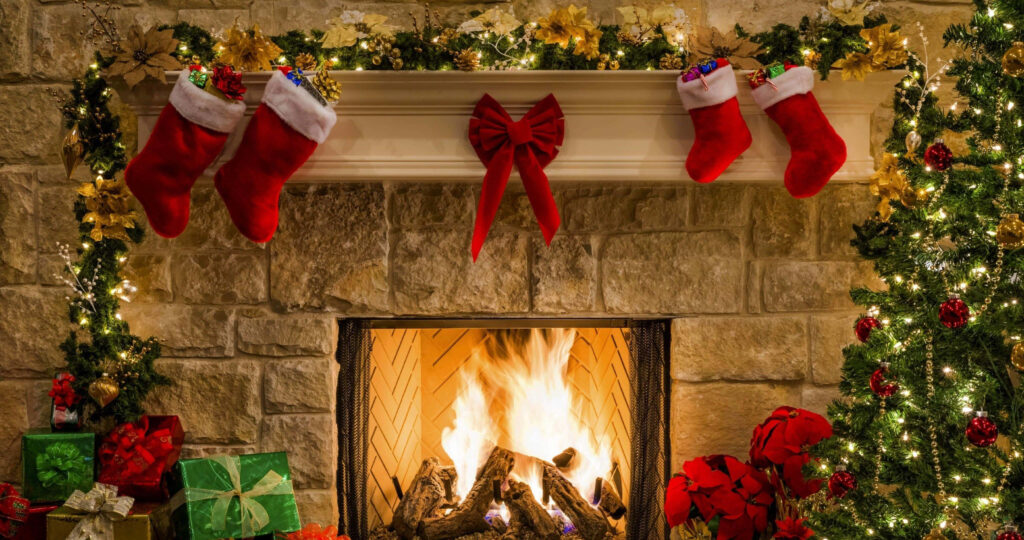 Cozy Christmas Scene Wallpaper with Fireplace & Festive Decor