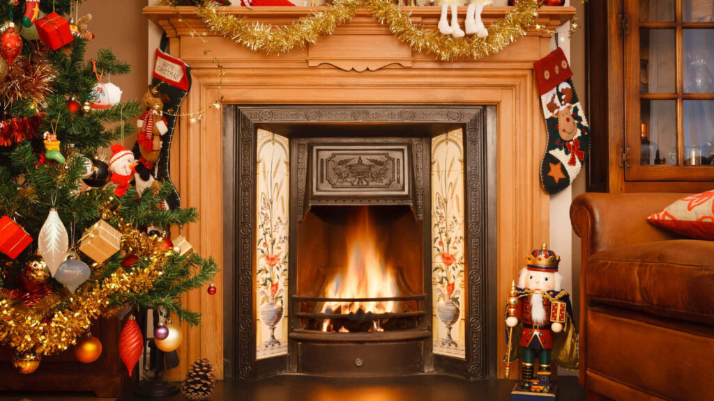 Cozy Christmas Wallpaper: Festive Fireplace & Nutcracker Scene