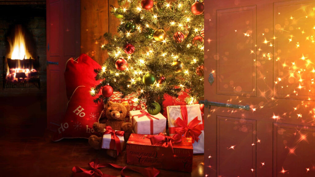 Cozy Christmas Scene: Decorated Tree, Gifts, and Warm Fireplace Wallpaper