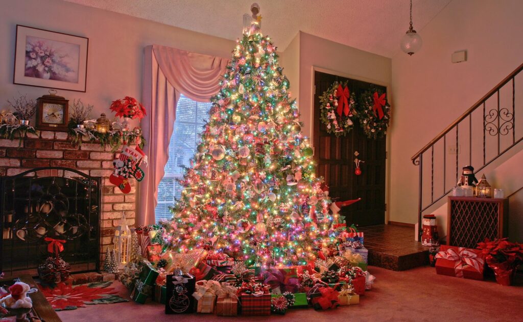 Cozy Christmas Wallpaper with Tree, Gifts & Festive Living Room