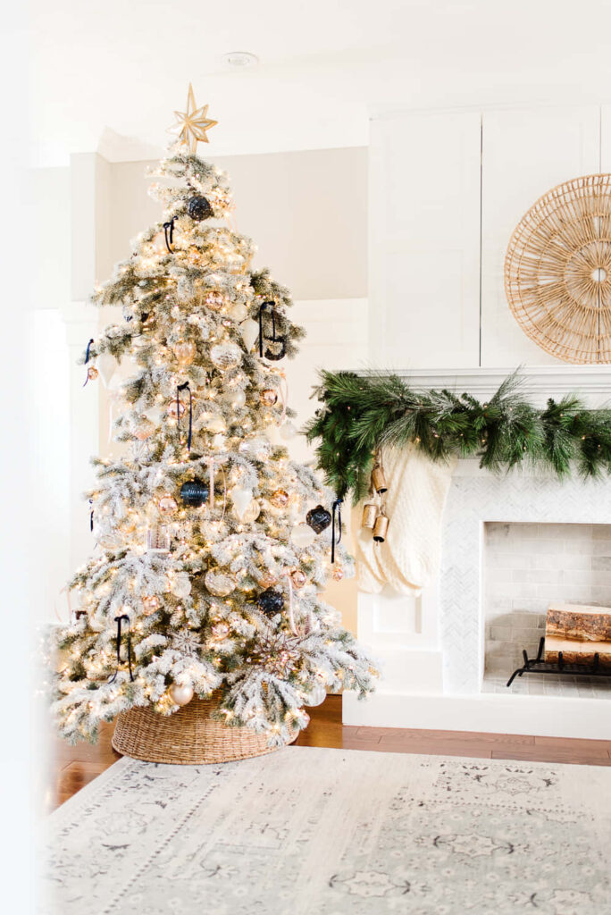 Festive Cozy Wallpaper: Snowy Tree & Warm Fireplace Holiday Scene