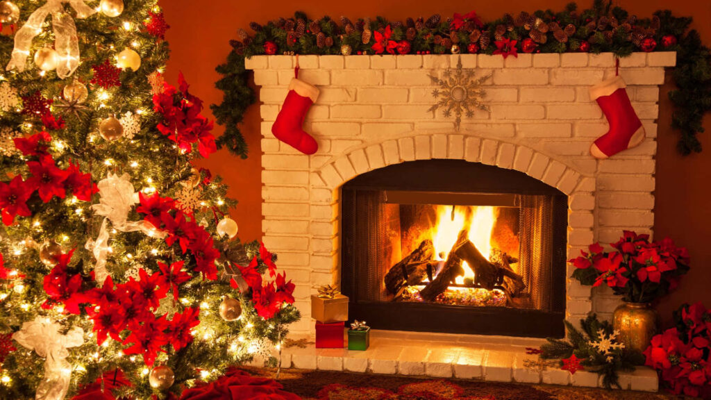 Cozy Christmas Wallpaper: Glowing Fireplace & Decorated Tree Background