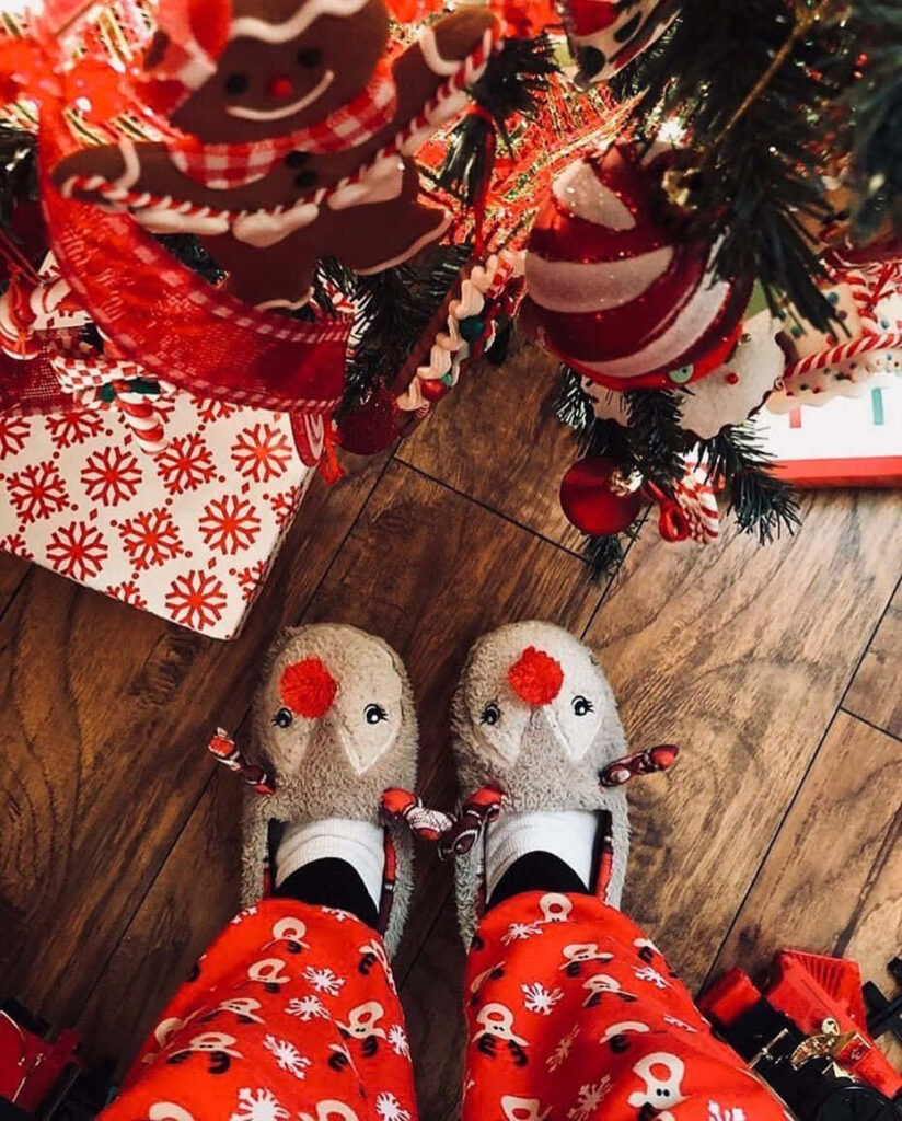 Cozy Christmas Wallpaper: Reindeer Slippers & Decorated Tree