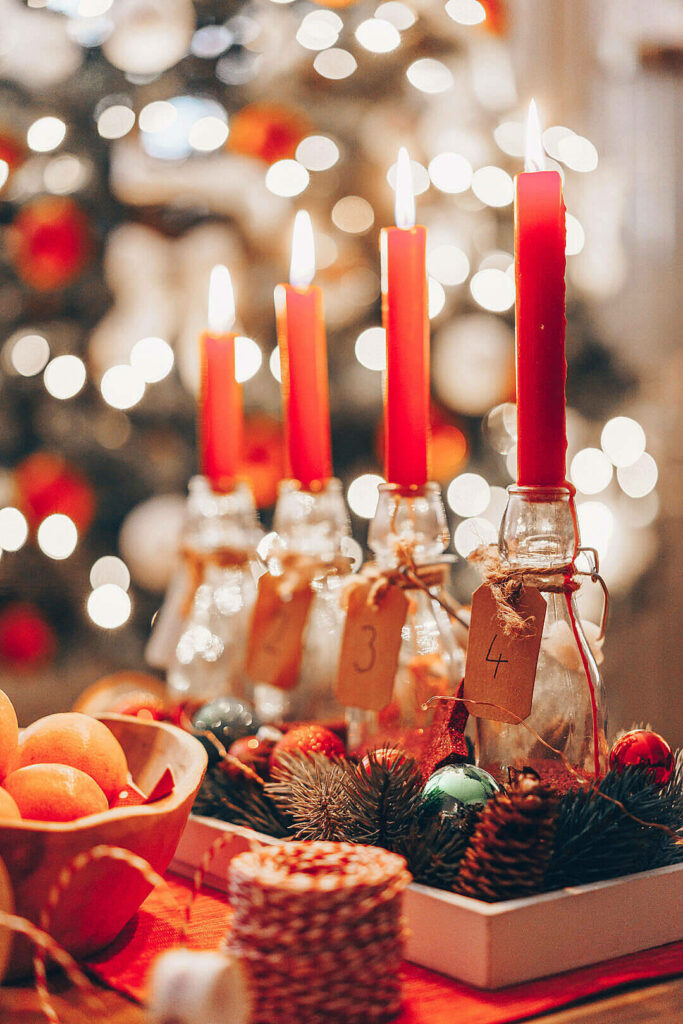 Cozy Christmas Wallpaper: Rustic Red Candle Glow & Holiday Charm