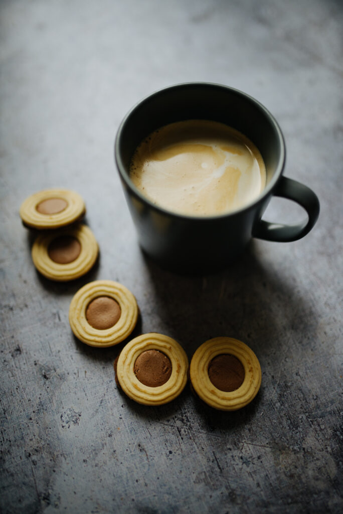 Cozy Coffee and Layered Cookies Wallpaper Background