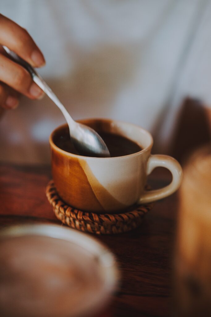 Cozy Coffee Cup Close-Up: Inviting Wallpaper Background
