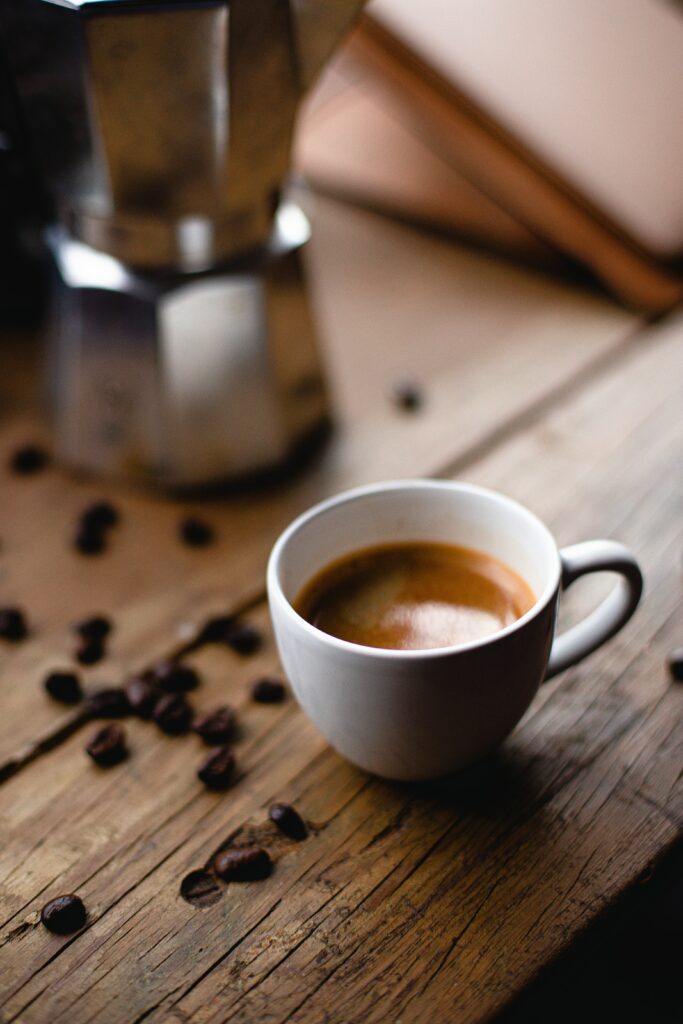 Cozy Coffee Cup on Rustic Wood - Aromatic Wallpaper Background