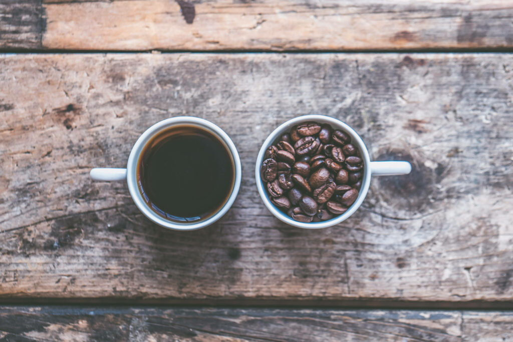 Cozy Rustic Desktop Wallpaper: Coffee Cups & Beans on Wood