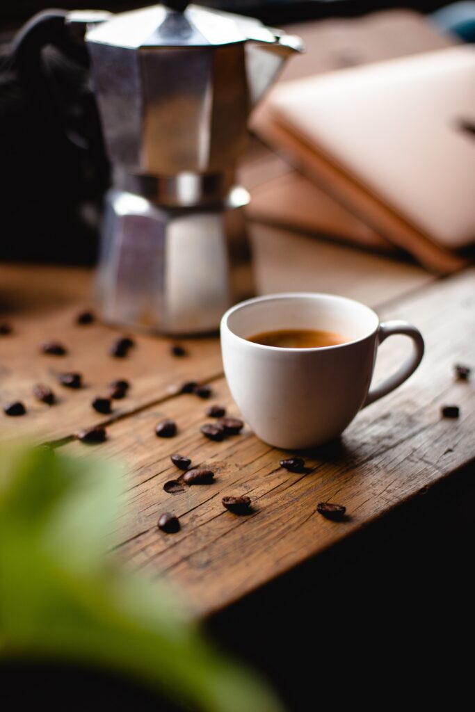 Cozy Coffee Wallpaper: Fresh Brew on Rustic Wood with Kettle