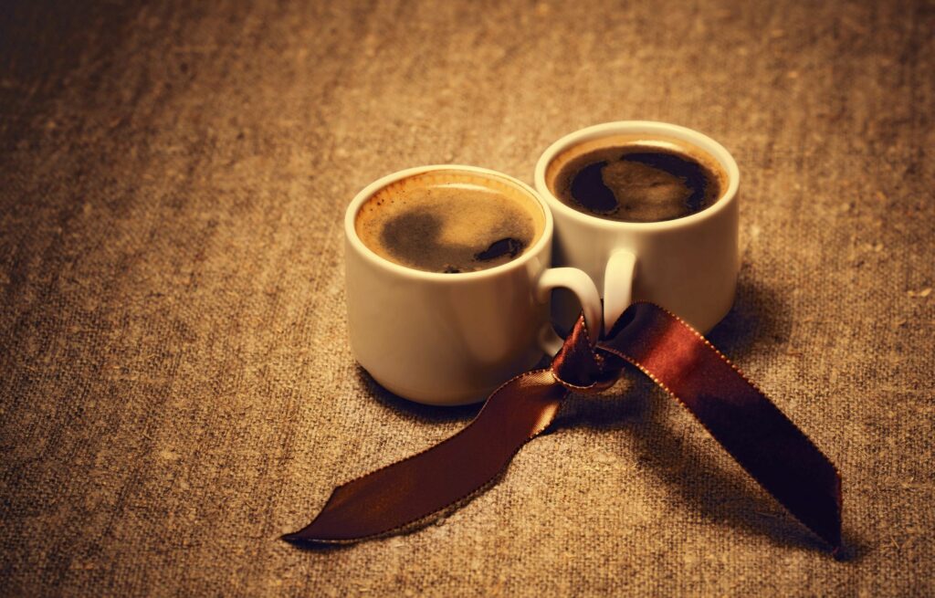 Romantic Coffee Cups Wallpaper - Warm & Cozy Background Design