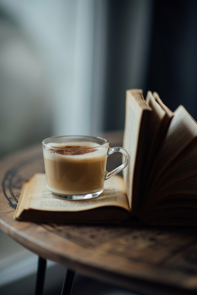 Cozy Coffee & Book Wallpaper: Tranquil Atmosphere Background