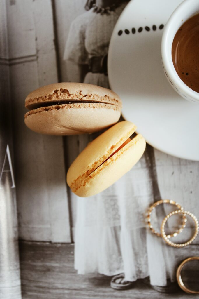 Cozy Coffee and Colorful Macarons: Delightful Breakfast Wallpaper