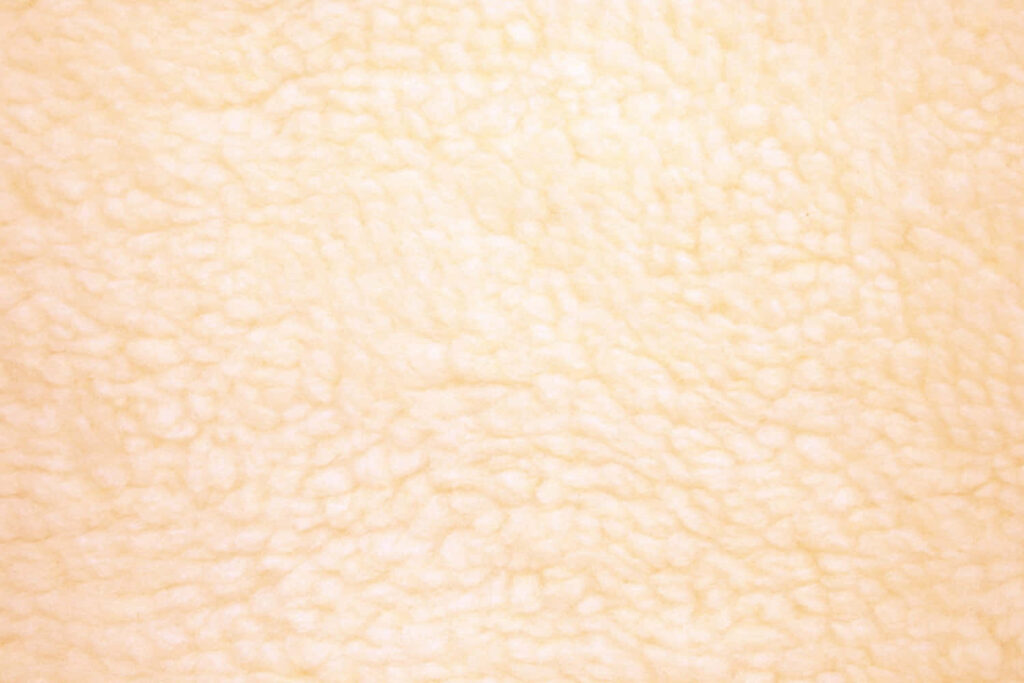 Cozy Cream Fabric Wallpaper: Soft Texture & Warm Background Design