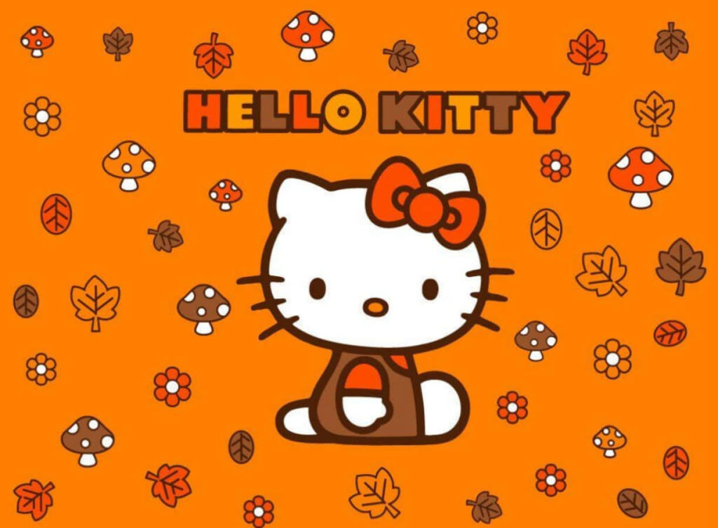 Cozy Fall Hello Kitty Wallpaper with Autumn Vibes and Orange Background