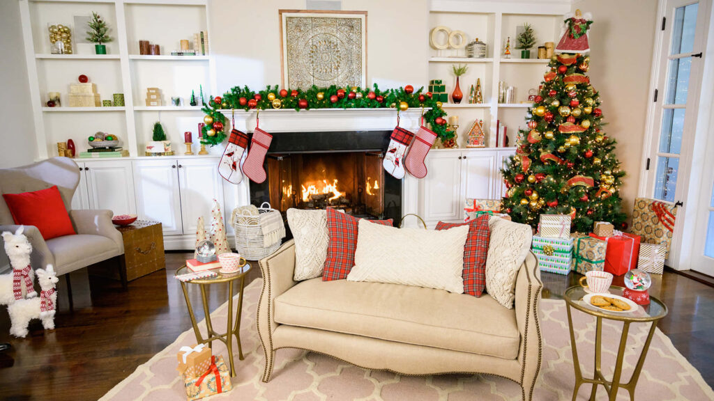 Cozy living room with festive Christmas tree stockings fireplace and warm holiday decor background Wallpaper