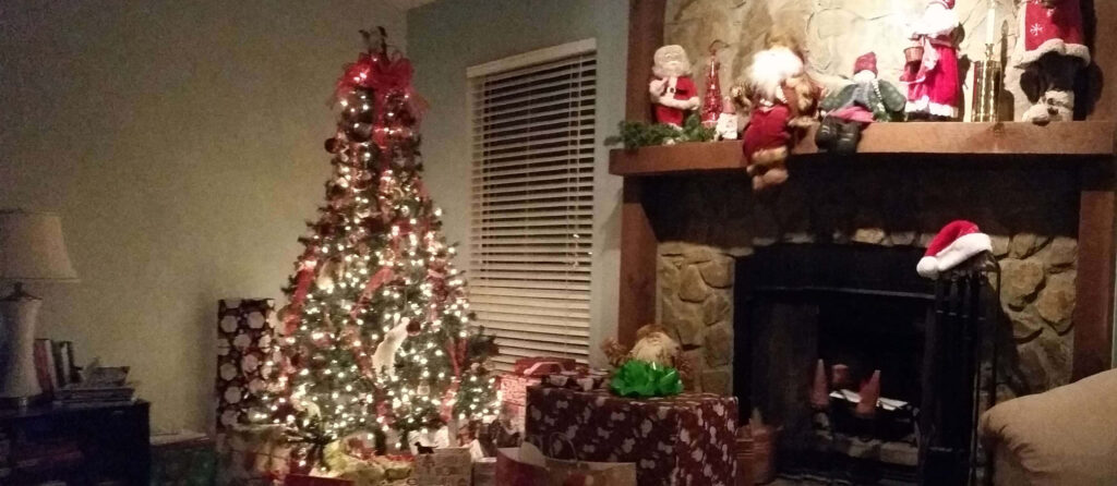 Cozy Festive Rustic Christmas Wallpaper with Warm Fireplace Scene