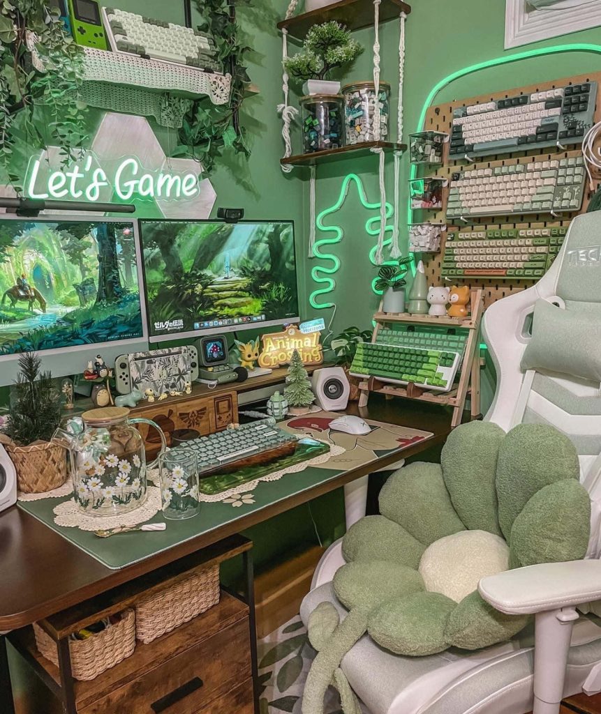 Cozy green gaming setup wallpaper with dual Zelda monitors mechanical keyboards and Animal Crossing accents